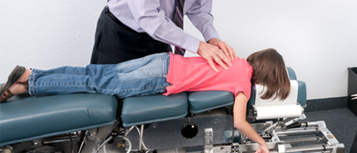 child getting a chiropractic adjustment